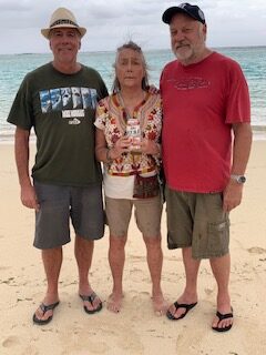 Fred, with his brother Tito and sister Kathy, standing on the beach in Palau.
